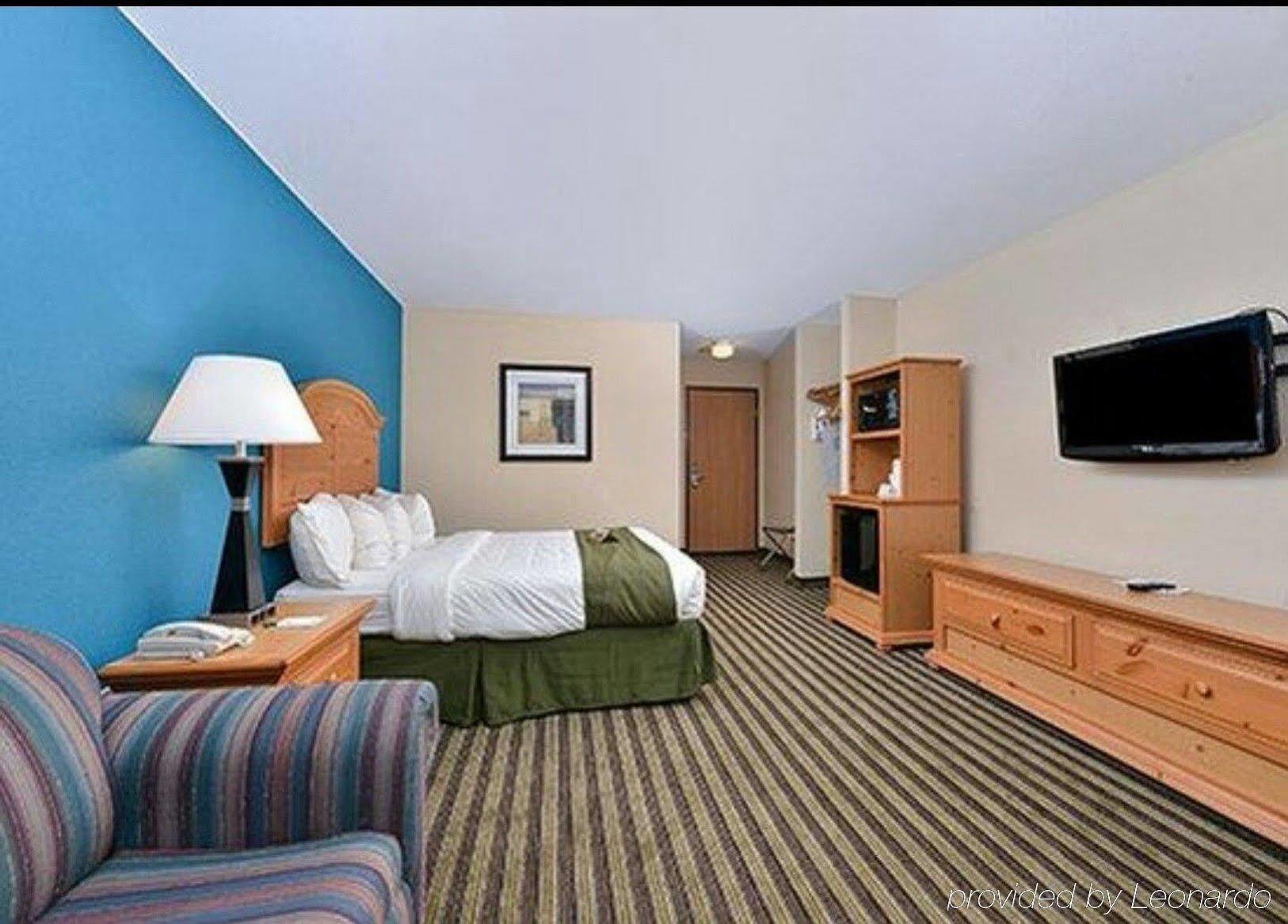 American Inn & Suites Peosta Exterior foto